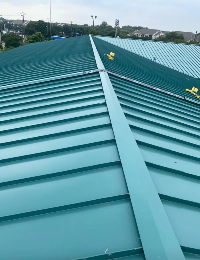 Green commercial metal roof ridge and valley for Metal Roof Repair in Picture Rocks